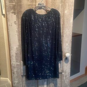 Beautiful beaded long sleeve dress by Aidan Mattox